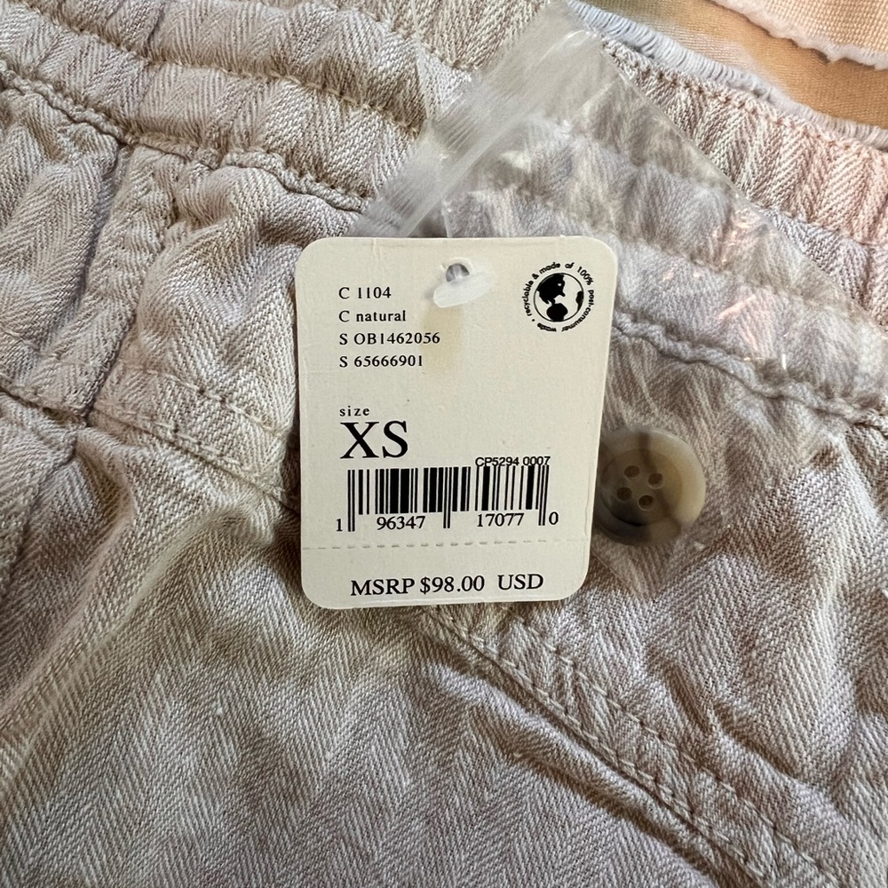 Free People Cream Textured Pants. Fit is more a medium. Very loose fitting.